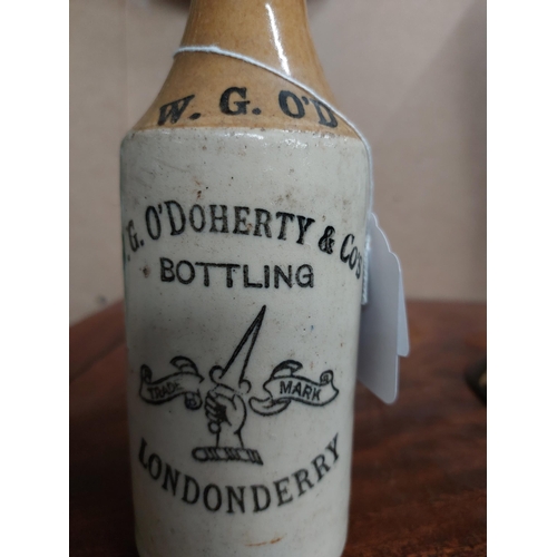 277 - W G O'Doherty and Co's Bottling Londonderry Ginger beer bottle. {20 cm H x 7 cm Dia}.