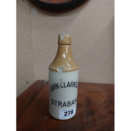 278 - John Clarke and Co Strabane stoneware Ginger beer bottle. { 20 cm H x 7 cm Dia}.