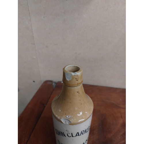 278 - John Clarke and Co Strabane stoneware Ginger beer bottle. { 20 cm H x 7 cm Dia}.