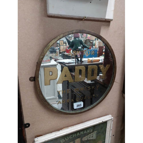 283 - Ask for Paddy The Whiskey of Age and Quality framed advertinsing mirror. {38 cm Dia}