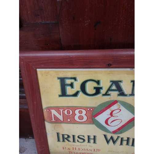 287 - Egan's Irish Whiskey Tullamore framed advertising print. {38 cm H x 48 cm }