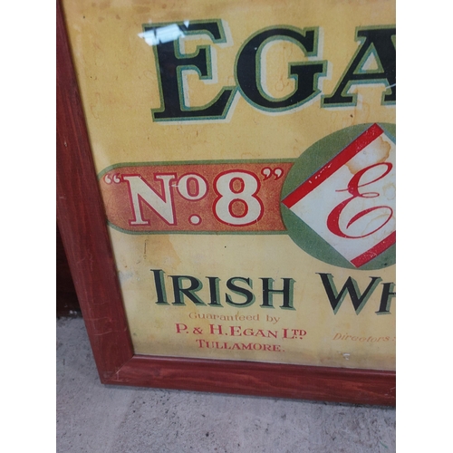 287 - Egan's Irish Whiskey Tullamore framed advertising print. {38 cm H x 48 cm }