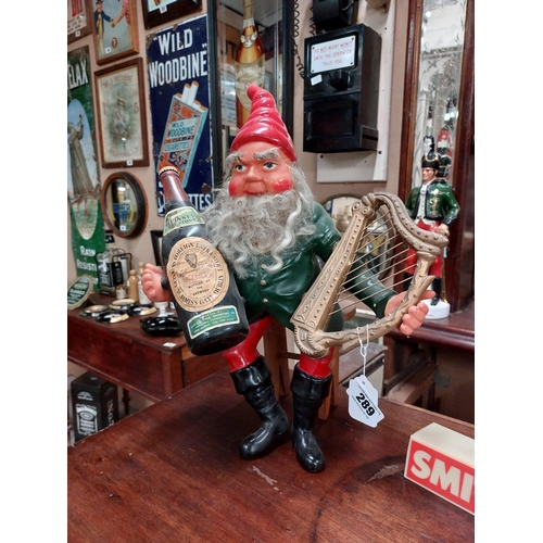 289 - 1950's Guinness Leprechaun with Harp and Bottle. {46 cm H x 36 cm W x 22 cm D}.