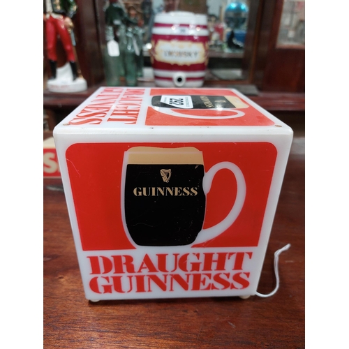 292 - Draught Guinness light up counter top. { 15 cm H x 15 cm W x 15 cm D}.