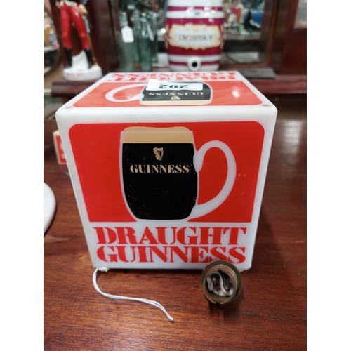 292 - Draught Guinness light up counter top. { 15 cm H x 15 cm W x 15 cm D}.