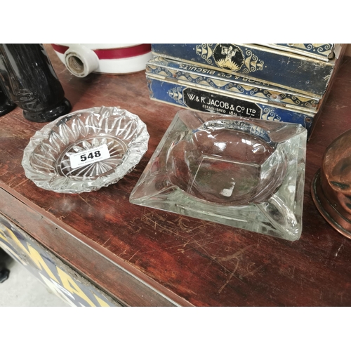 548 - Two cut glass ash trays.