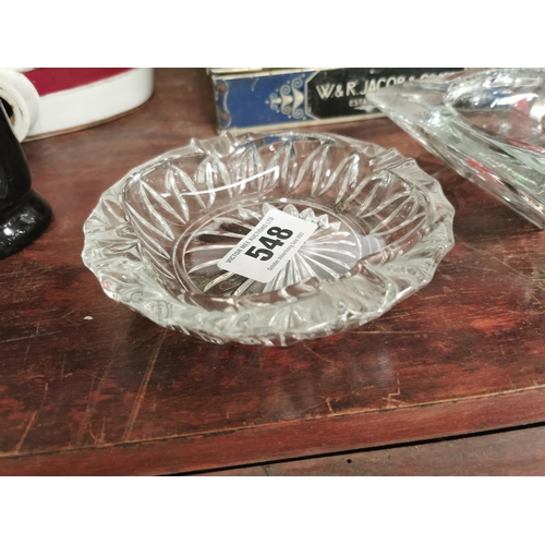 548 - Two cut glass ash trays.