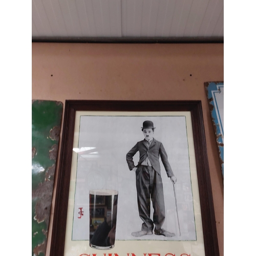 84 - Charlie Chaplin Guinness framed advertising  print. {64 cm H x 53 cm W}.