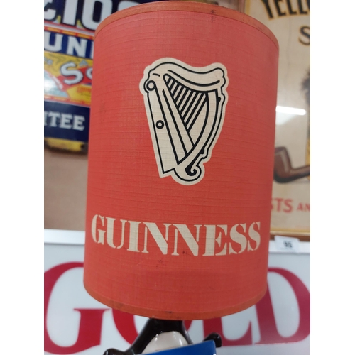 92 - Guinness Penguin Lamp with original shade. { 38 cm H x 17 cm Dia}.