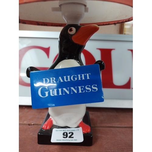 92 - Guinness Penguin Lamp with original shade. { 38 cm H x 17 cm Dia}.