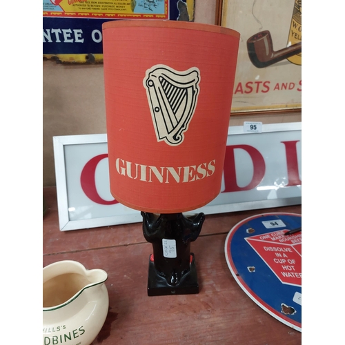 92 - Guinness Penguin Lamp with original shade. { 38 cm H x 17 cm Dia}.