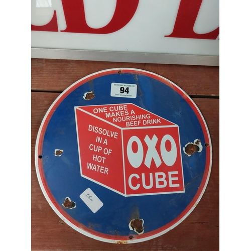 94 - OXO cube circular enamel advertising sign. {30 cm Dia}.