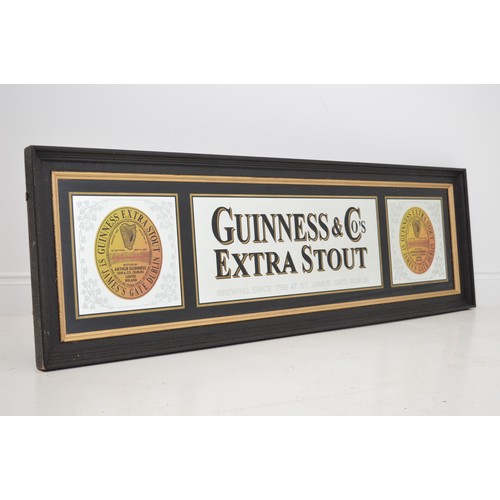 307a - Guinness Extra Stout framed advertising mirror . { 53cm H X 170cm W }.