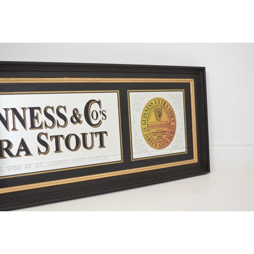 307a - Guinness Extra Stout framed advertising mirror . { 53cm H X 170cm W }.