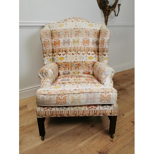 100 - Mahogany and Kilim upholstered wing back arm chair raised on square legs {107 cm H x 75 cm W x 85 cm... 