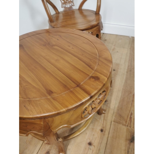 1008 - Three piece Oriental carved hardwood suite  - Two armchairs { 80cm H X 64cm Sq }  and a coffee table... 