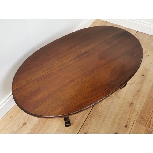 1009 - Mahogany coffee table the oval top raised on platform base with cabriole legs { 44cm H X 104cm W X 6... 