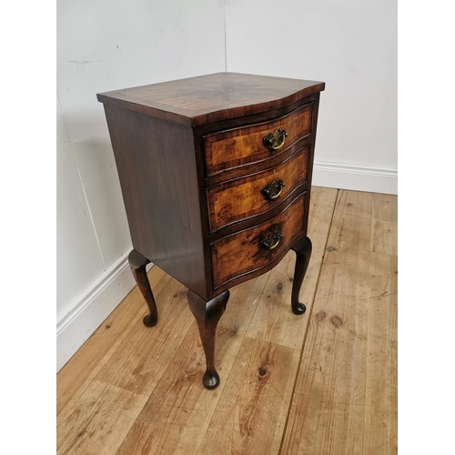 1010 - Edwardian burr walnut bedside locker with three graduated drawers raised on cabriole legs { 74cm H X... 