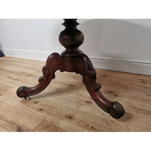 1014 - 19th. C. mahogany breakfast table the oval top raised on turned column and three outswept feet { 75c... 