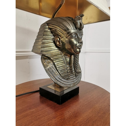 1016 - Designer brass table lamp in the form of a Pharoah {70 cm H x 50 cm W x 27 cm D}.