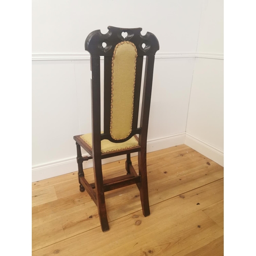 1017 - 19th C. oak side chair with upholstered back and seat raised on turned legs and single stretcher {11... 