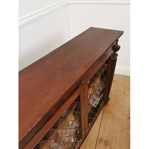 1020 - Regency mahogany side cabinet the two doors with brass grilles flanked by reeded columns raised on t... 