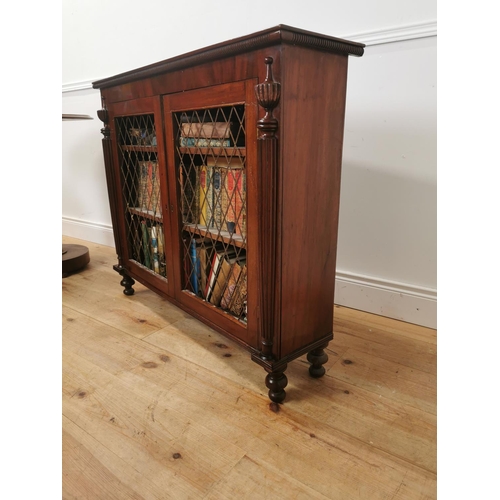 1020 - Regency mahogany side cabinet the two doors with brass grilles flanked by reeded columns raised on t... 