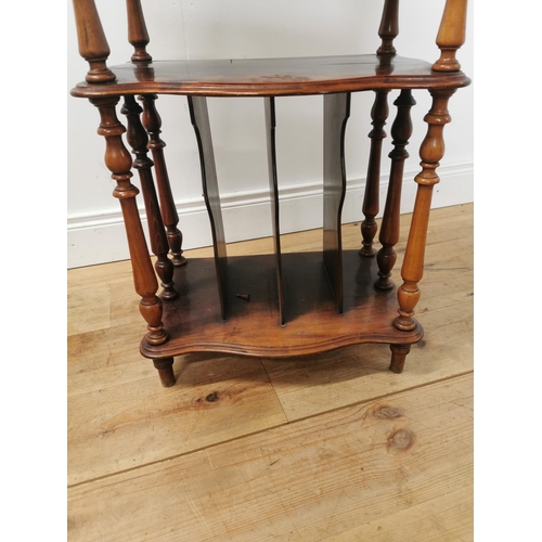 1022 - 19th. C. mahogany five tier serpentine fronted whatnot raised on turned columns { 130cm H X 50cm W X... 