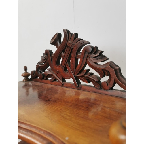 1022 - 19th. C. mahogany five tier serpentine fronted whatnot raised on turned columns { 130cm H X 50cm W X... 