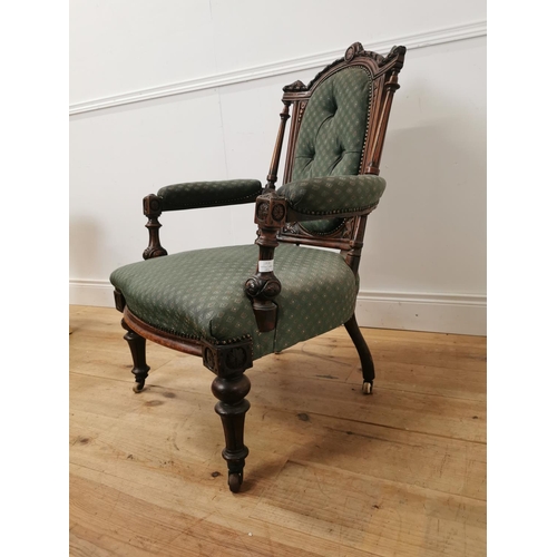 1037 - 19th. C. upholstered walnut open armchair raised on turned legs { 95cm H X 70cm W X 70cm D }.