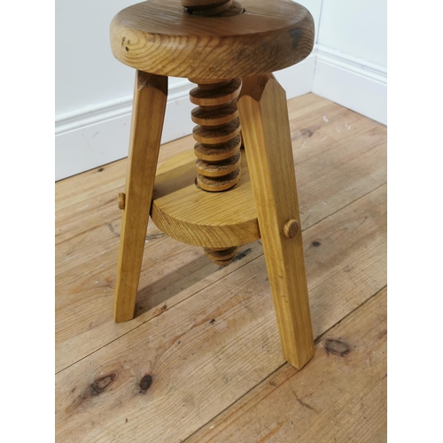 1044 - Pine revolving artist's stool { 58cm H X 35cm Dia  }