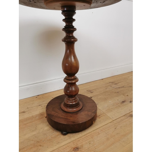 1069 - 19th. C. mahogany lamp table on turned column and platform base. {79 cm H x 57 cm Diam}.