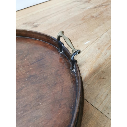 1083 - Early 19th. C. mahogany serving tray with original brass handles { 8cm H X 77cm W X 52cm D }.