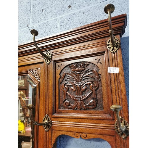 1088 - Edwardian carved oak hat and coat stand  {210cm H X 124cm W X  41 cm D}.