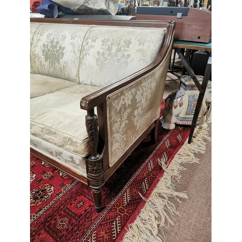 1095 - 20th. C. upholstered mahogany four seater couch raised on turned legs in the Regency style { 82cm H ... 