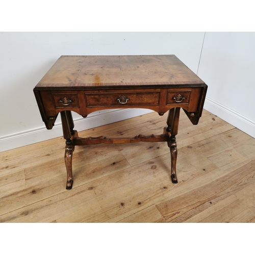 110 - Good quality 19th C. burr walnut and satinwood sofa table raised on square columns and outswept feet... 