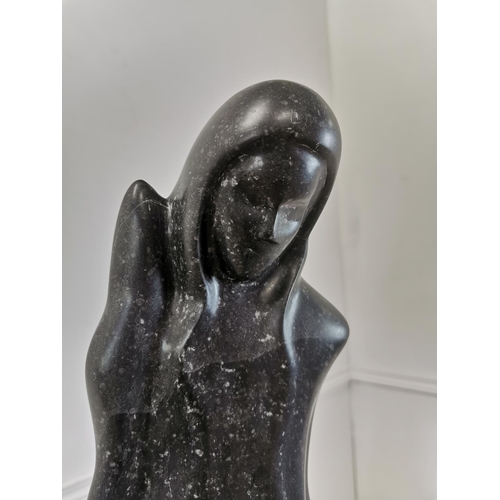 1123 - Model of Lady in polished black marble on cream marble polished plinth. {145 cm H x 25 cm W x 25 cm ... 