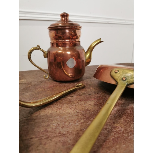 114 - Two copper and brass pans and a teapot