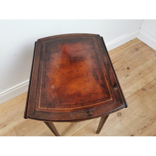 120 - Mahogany drop leaf lamp table with inset leather top raised on square reeded legs in the Georgian ma... 