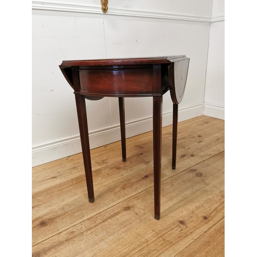 120 - Mahogany drop leaf lamp table with inset leather top raised on square reeded legs in the Georgian ma... 