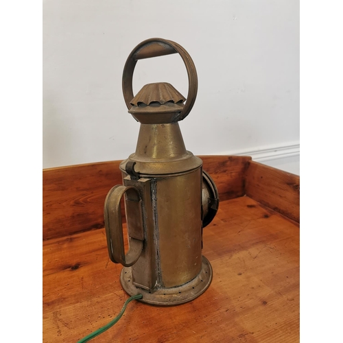 122 - Early 20th C. brass railway lantern {39 cm H x 16 cm W x 22 cm D}.