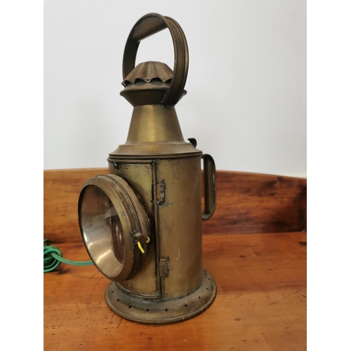 122 - Early 20th C. brass railway lantern {39 cm H x 16 cm W x 22 cm D}.