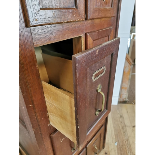 134 - Early 20th C. oak bank of eight Office Drawers with original brass handles. {150 cm H x 61 cm W x 51... 
