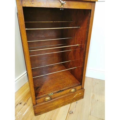 148 - Early 20th. C. oak office cabinet with tambour door { 93cm H X 52cm W X 54cm D }