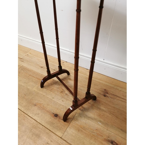 15 - Good quality Edwardian rosewood lamp table raised on turned columns {75 cm H x 41 cm W x 30 cm D}.
