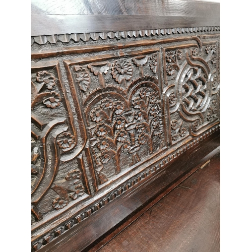 170 - 18th C. and later carved oak Monk's bench {112 cm H x 118 cm W x 54 cm D}.