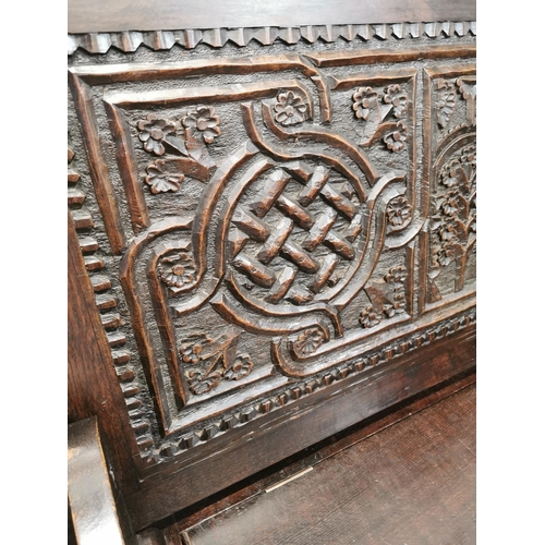 170 - 18th C. and later carved oak Monk's bench {112 cm H x 118 cm W x 54 cm D}.