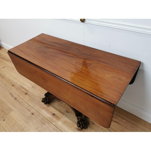 175 - 19th C. mahogany double drop leaf side table raised on bulbous column four outswept legs and lion's ... 