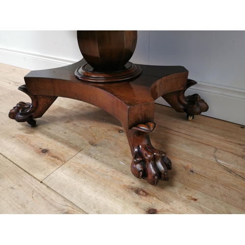 175 - 19th C. mahogany double drop leaf side table raised on bulbous column four outswept legs and lion's ... 