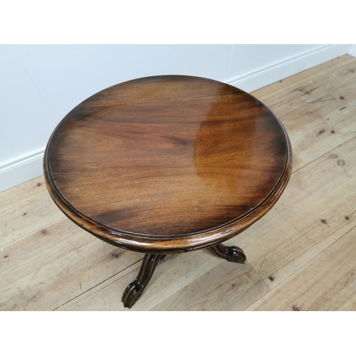 230 - Mahogany lamp table raised on turned column and three outswept legs { 60cm H }.